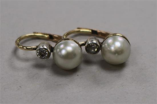 A pair of yellow metal, cultured pearl and diamond earrings.